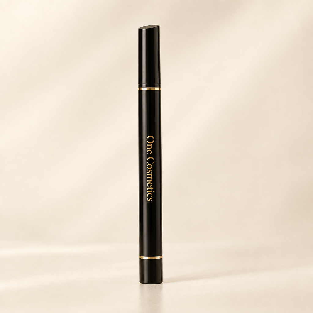 Illustrative closed One Cosmetics black eyeliner pen with gold trim